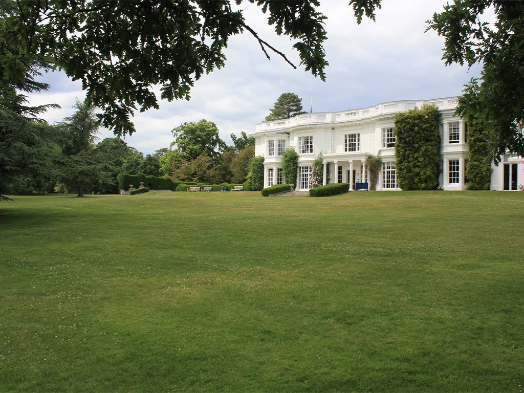 Photograph showing lawn and historic buildings within Greenlands Campus at Henley-on-Thames.