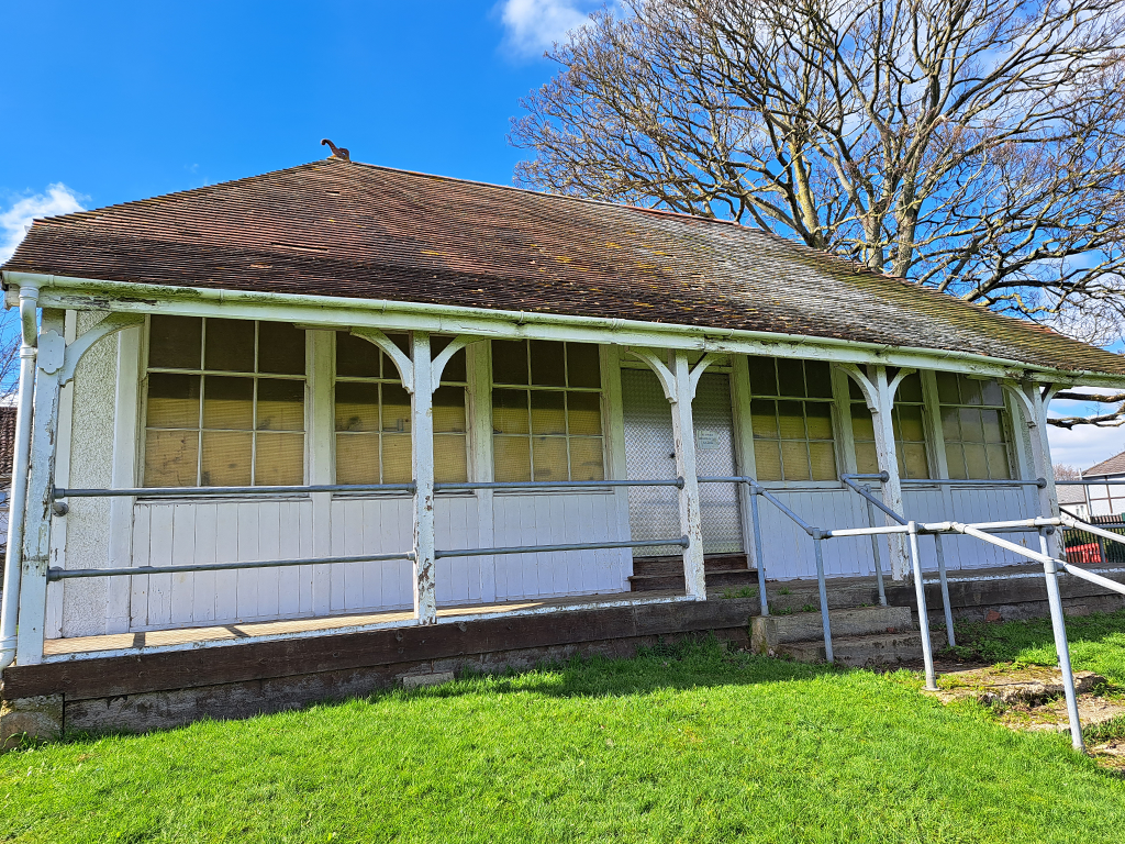 Former pavilion building located within the sports pitch site at The Folley, Cheltenham.